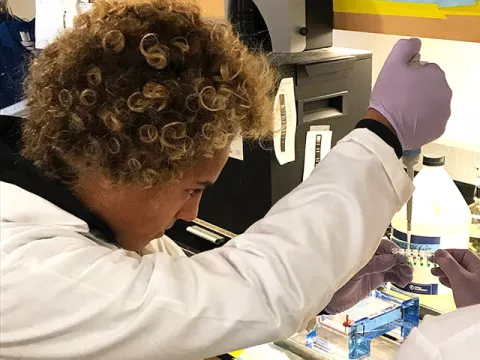 PITCH program participant conducting laboratory research